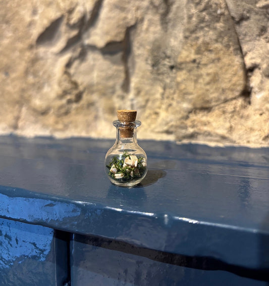 Small mammal teeth mini bottle